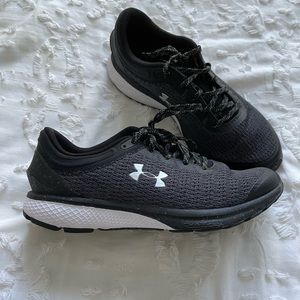 Black and White Under Armour Charged Sneakers